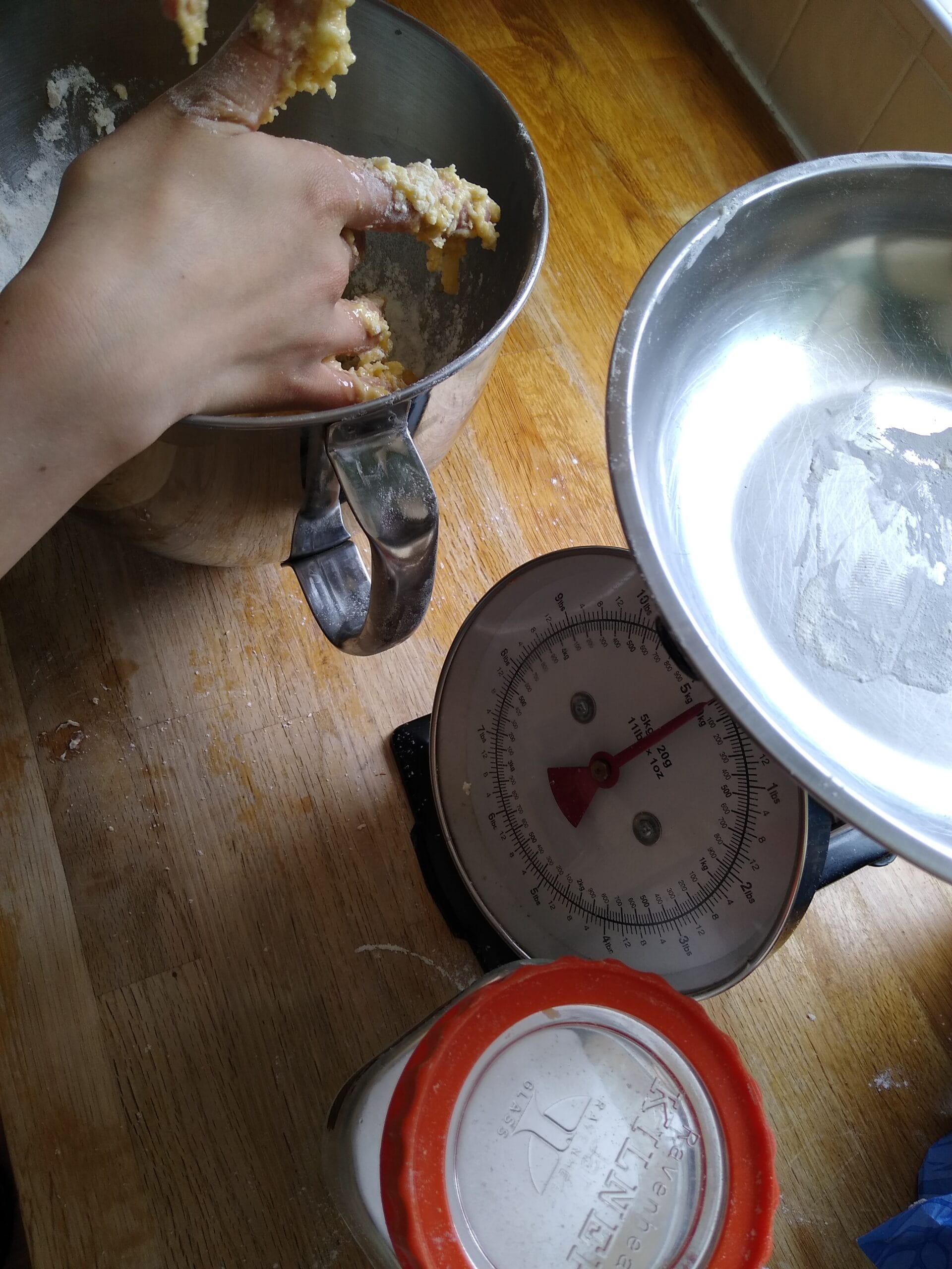 Children baking together, measuring and mixing ingredients